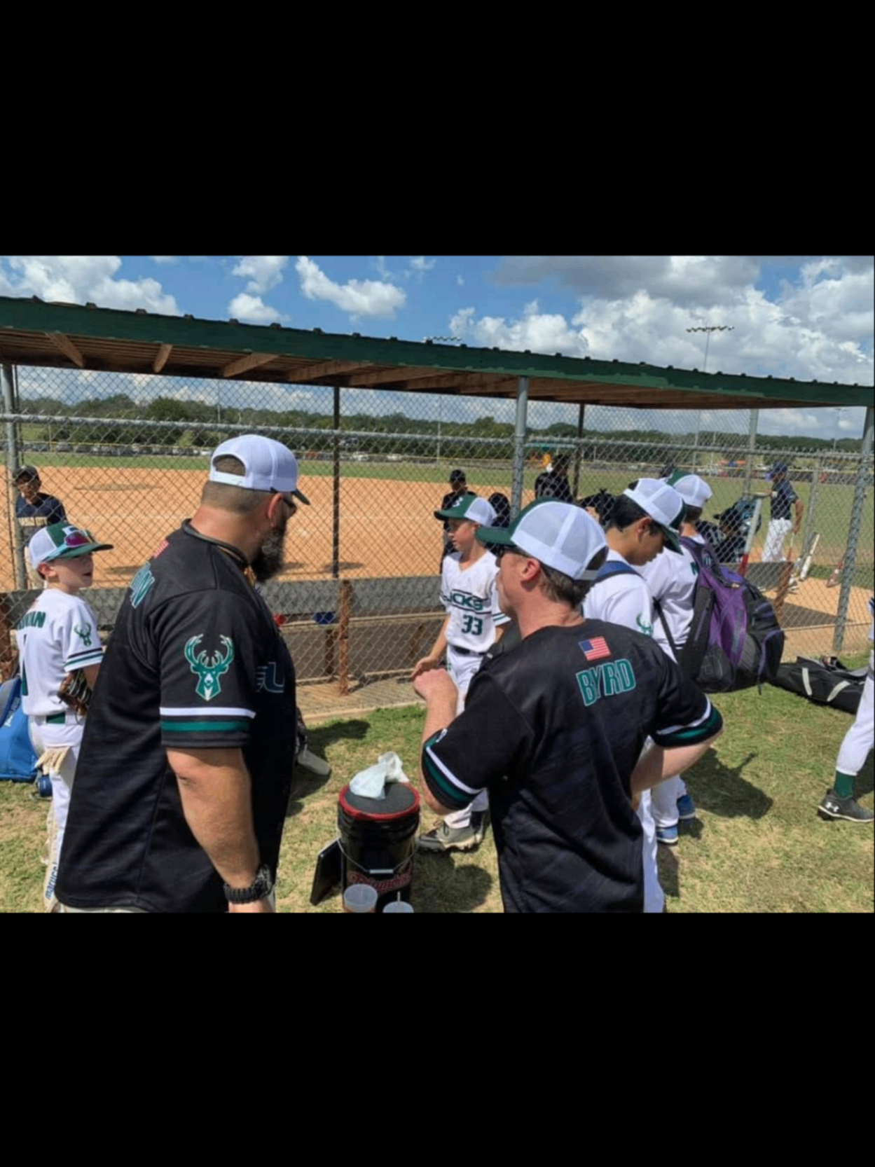 Boerne Bucks coaches in the dugout